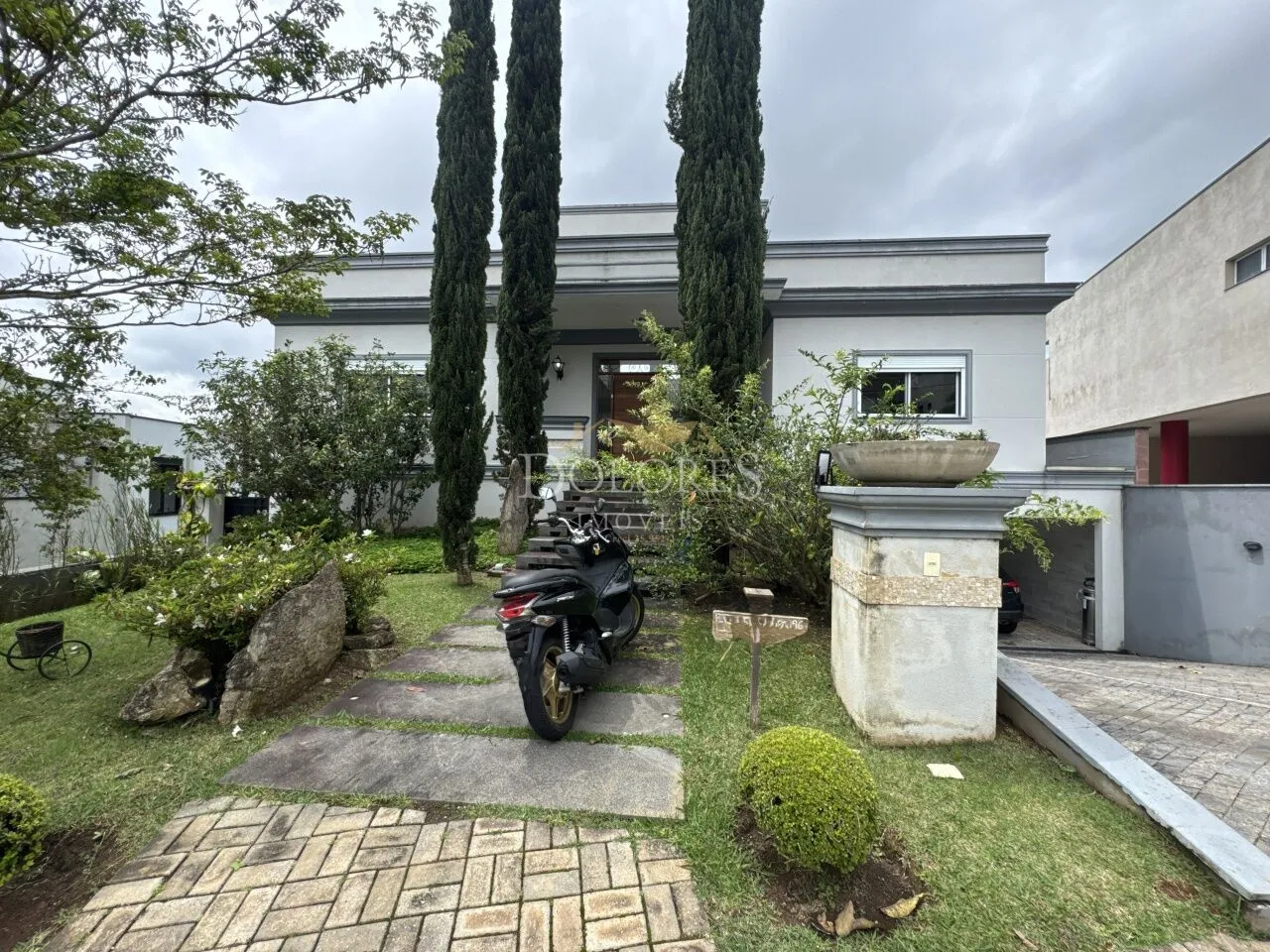 Casa em condomínio com 4 suítes em Brisas 1 — foto do imóvel